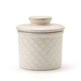 XELA front view of butter crock showing embossed diamond pattern and speckled white finish for stylish serving