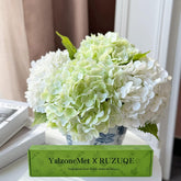 YalzoneMet front view of four hydrangea stems showing full blooms and colors