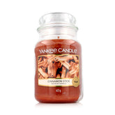 Yankee Candle cinnamon stick front view shows jar and warm spiced fragrance benefit