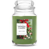 Yankee Candle front jar showing mistletoe scent and long burn benefit