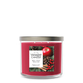Yankee Candle Red Apple Wreath front jar with festive label showing seasonal appeal
