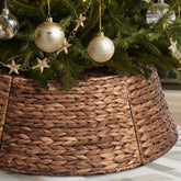 Yonsya rattan front view showing rustic tree collar and neat base coverage