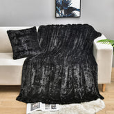 YUSOKI front view of black throw showing plush coverage and elegant finish