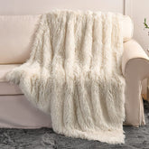 YUSOKI cream throw front folded showing plush look and cozy comfort