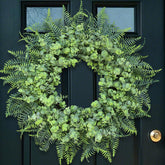 YXZZWL wreath front view on door adding inviting curb appeal