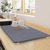 ZACELOVE front view of stone mat showing full 24x16 surface and tidy counters