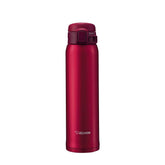 Zojirushi front view showing garnet red mug and travel-ready finish