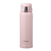 Zojirushi front view of pearl pink mug showing sleek finish and compact shape for everyday use