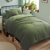 Zzlpp comforter front view showing full olive green bedding and cozy look