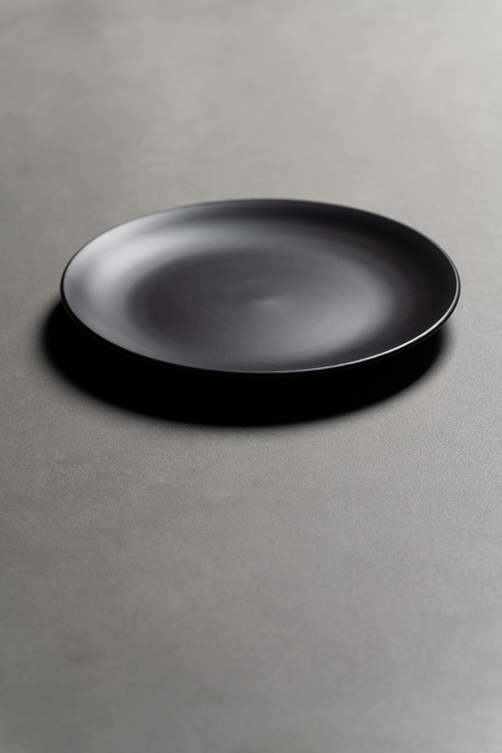 10 Strawberry Street plate with fork and knife showing 10.5 inch scale and versatility