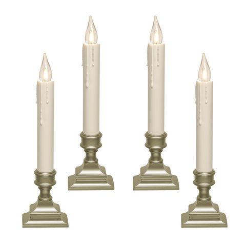 612 Vermont front view of four window candles showing pewter bases and warm glow for elegant decor