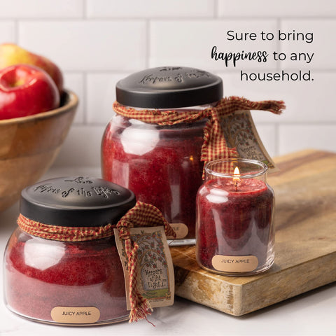 A Cheerful Giver candle burning on dining table providing cozy aroma benefit