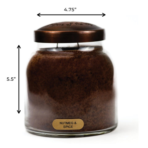 A Cheerful Giver brown jar staged in living room adding cozy atmosphere