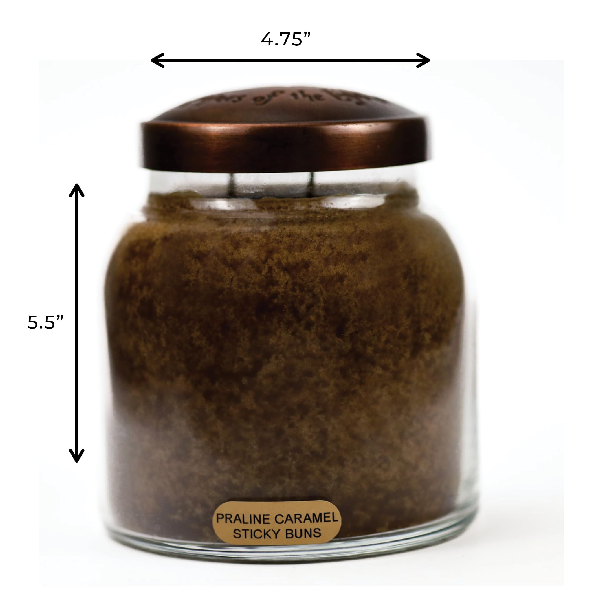 A Cheerful Giver candle beside common objects showing 34oz scale