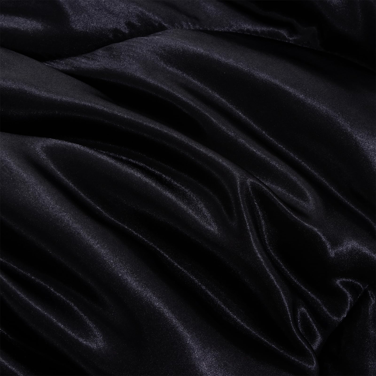 A Nice Night comforter in hand showing lightweight, easy handling