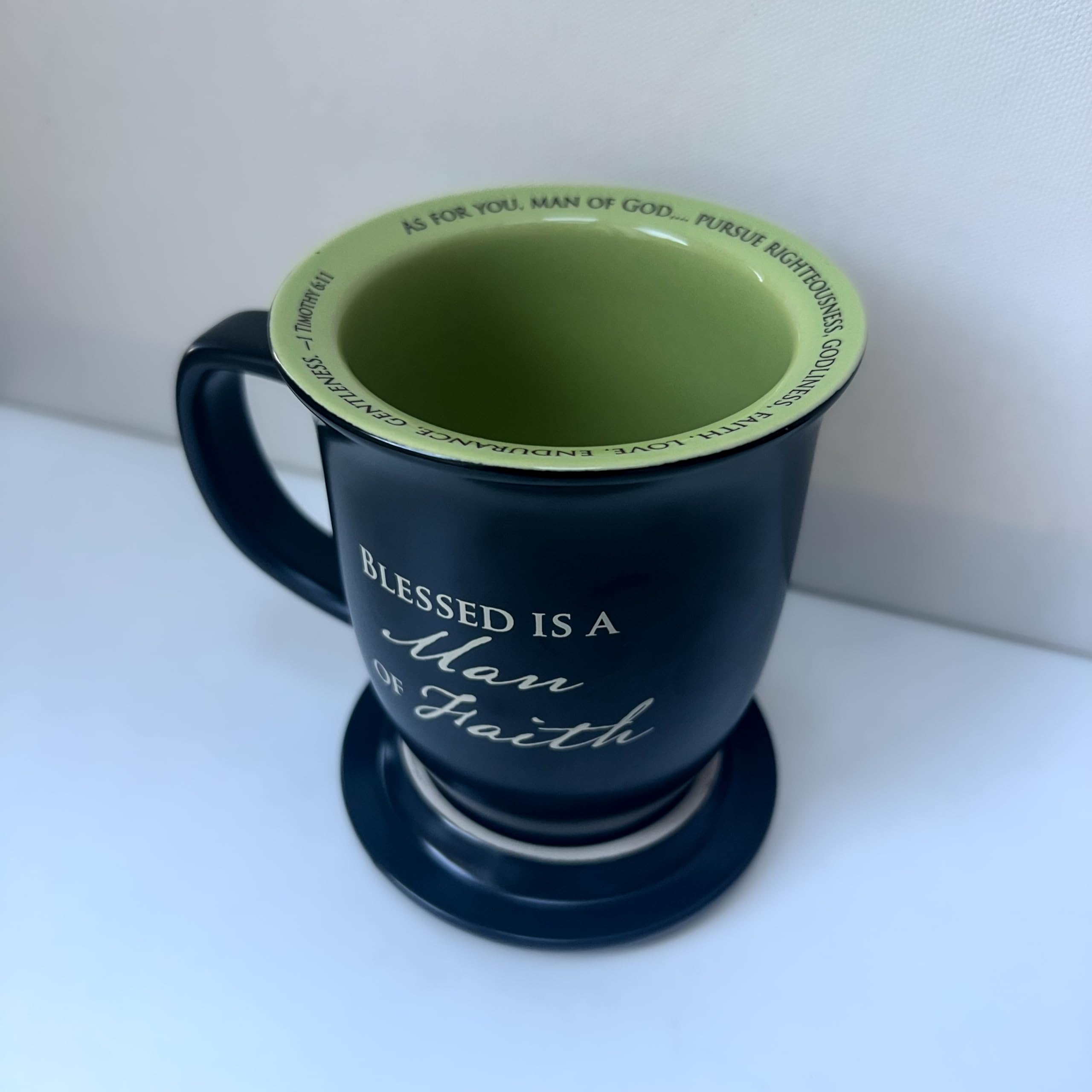 Abbey + CA Gift mug held in hand showing scale and comfortable grip