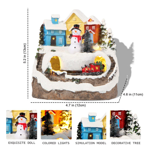 ABLINGAMSUIT illuminated village on mantle at night, creates cozy atmosphere