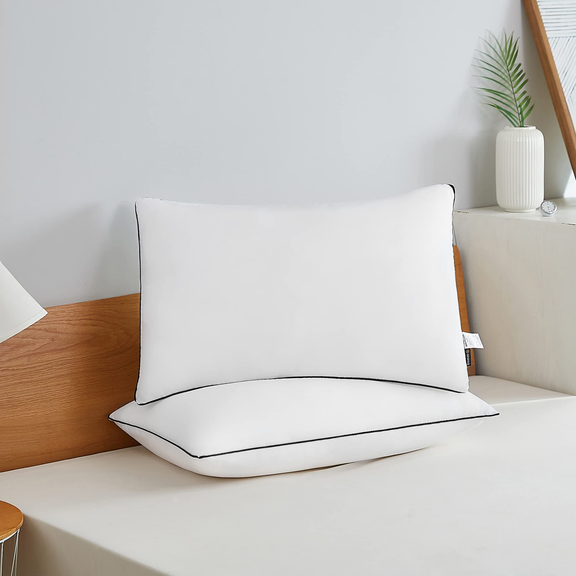 Acanva pillow expanded loft close-up showing fluffy fill and quick rebound benefit