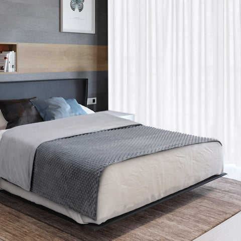 Acdyion size comparison on sofa showing 48x72 fit and visual scale benefit
