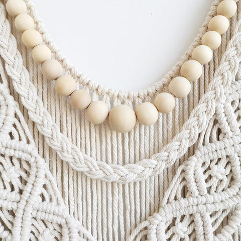 Achart close-up knot detail of cotton cords highlights handcrafted texture