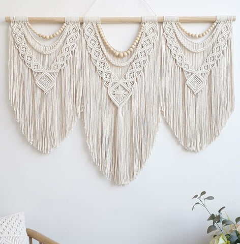 Achart front view of large macrame wall hanging shows boho focal point