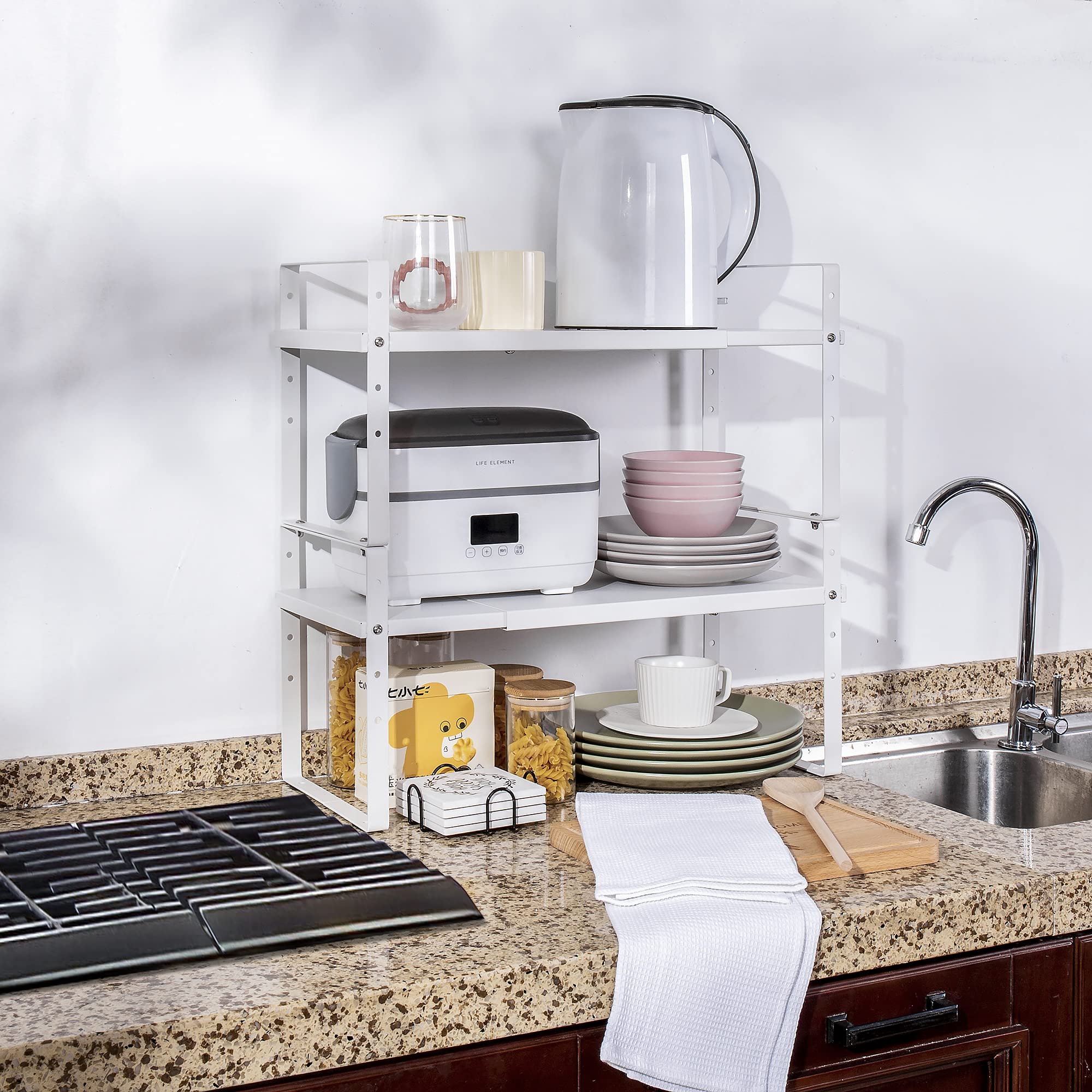 Across-Star kitchen lifestyle scene showing clutter-free counter and tidy cooking benefit