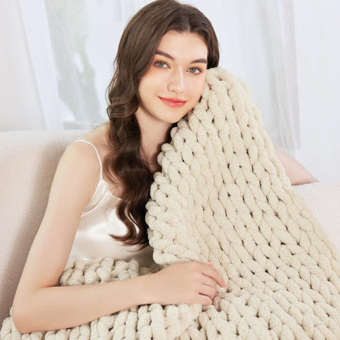 Admitrack folded throw showing size compact storage and easy layering