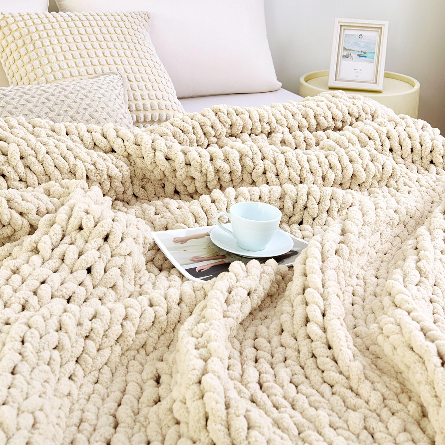 Admitrack blanket front view on couch adds cozy decor and warmth