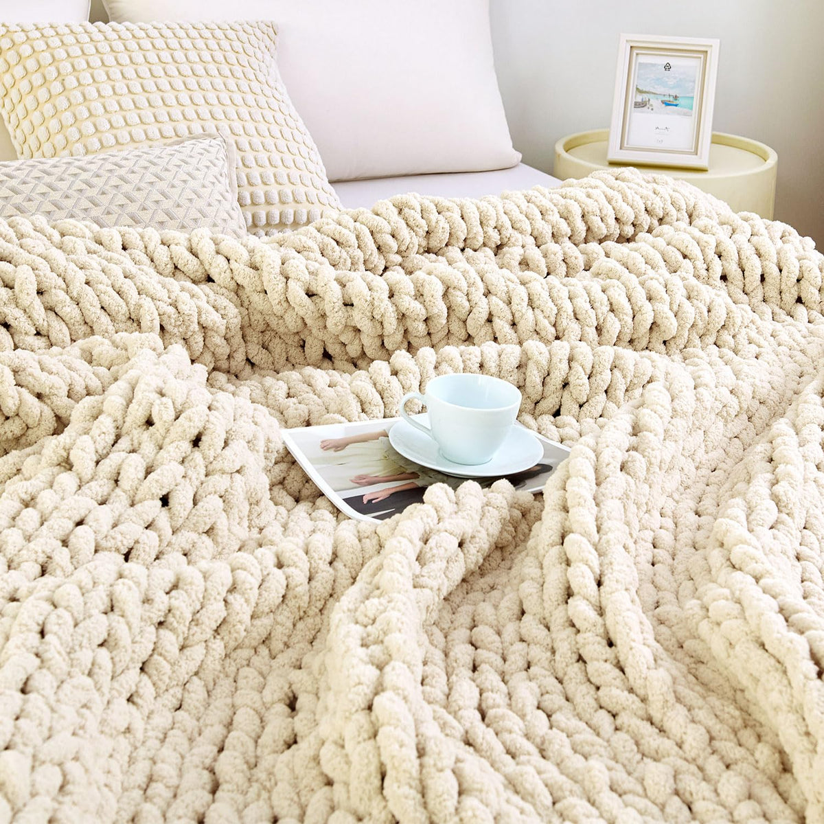 Admitrack blanket front view on couch adds cozy decor and warmth