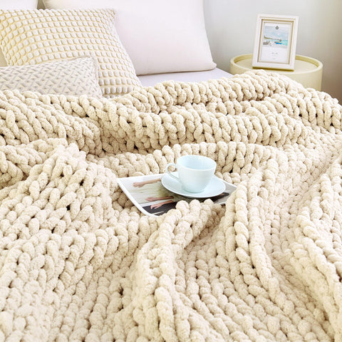 Admitrack blanket front view on couch adds cozy decor and warmth