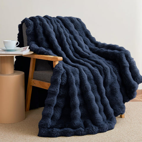 Admitrack front view navy throw showing full drape and color, cozy styling