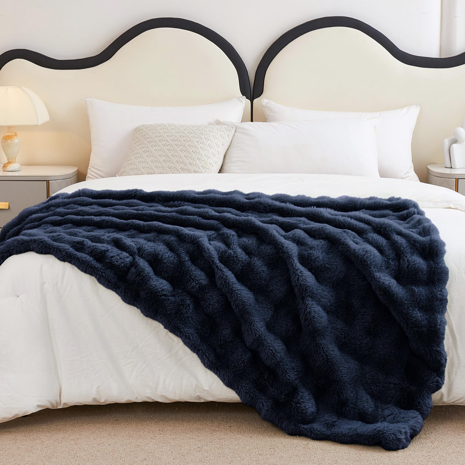 Admitrack throw on sofa in living room, enhances decor and warmth