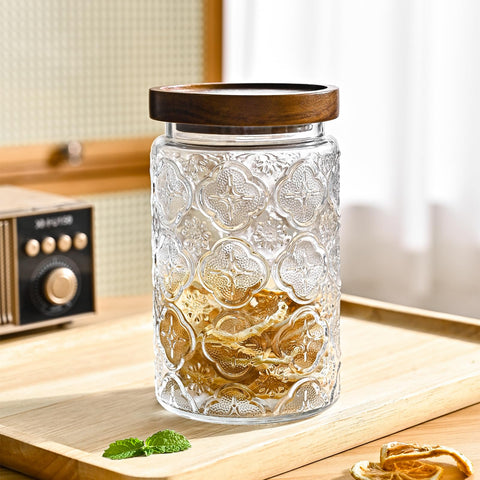 Adodeen jar held in hand to show 32oz scale and portion control benefit