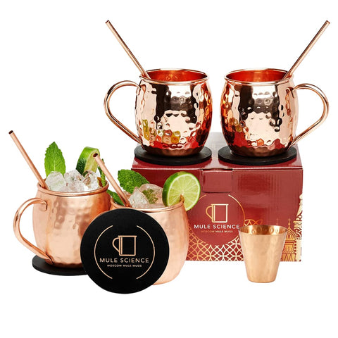 Advanced Mixology front view of four copper mugs for elegant serving