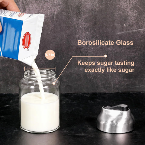 Aelga dispensing sugar detail at spout showing controlled pour and reduced spills
