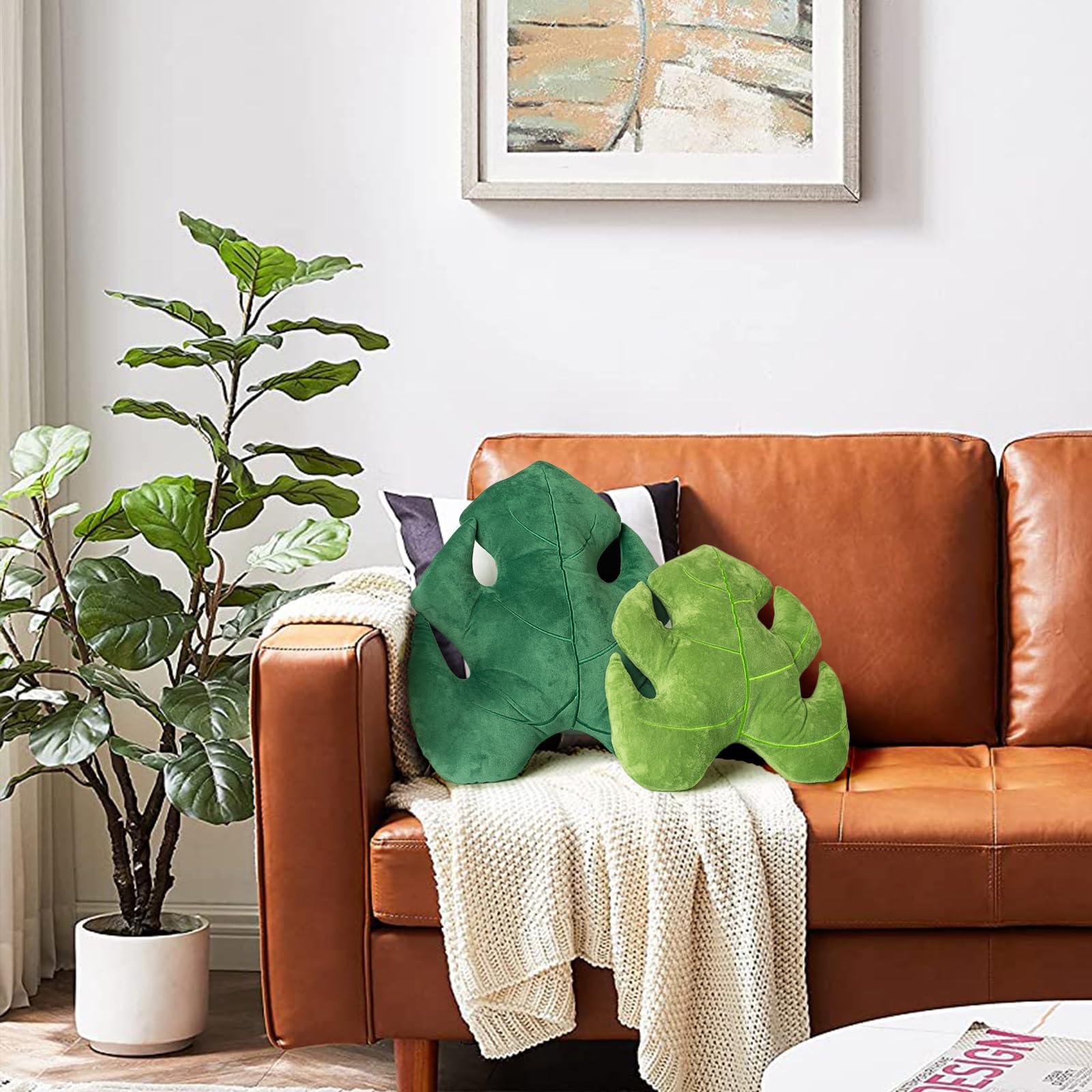 AELS Monstera size comparison with book demonstrating scale and fit