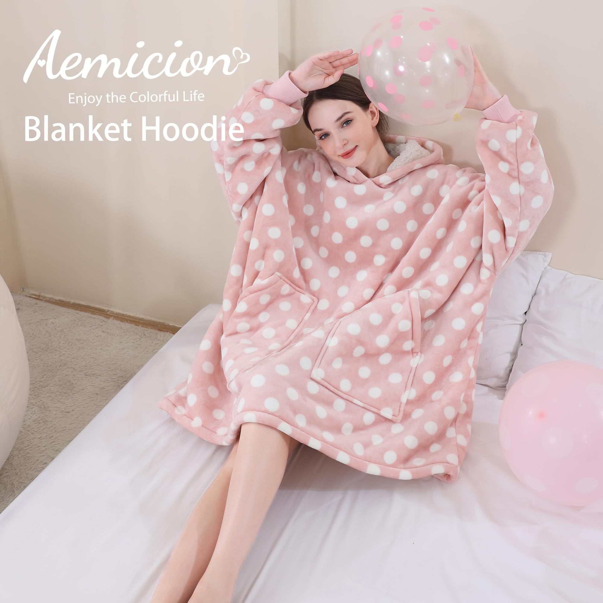 Aemicion full-length lifestyle shot on couch illustrating relaxation and roomy fit
