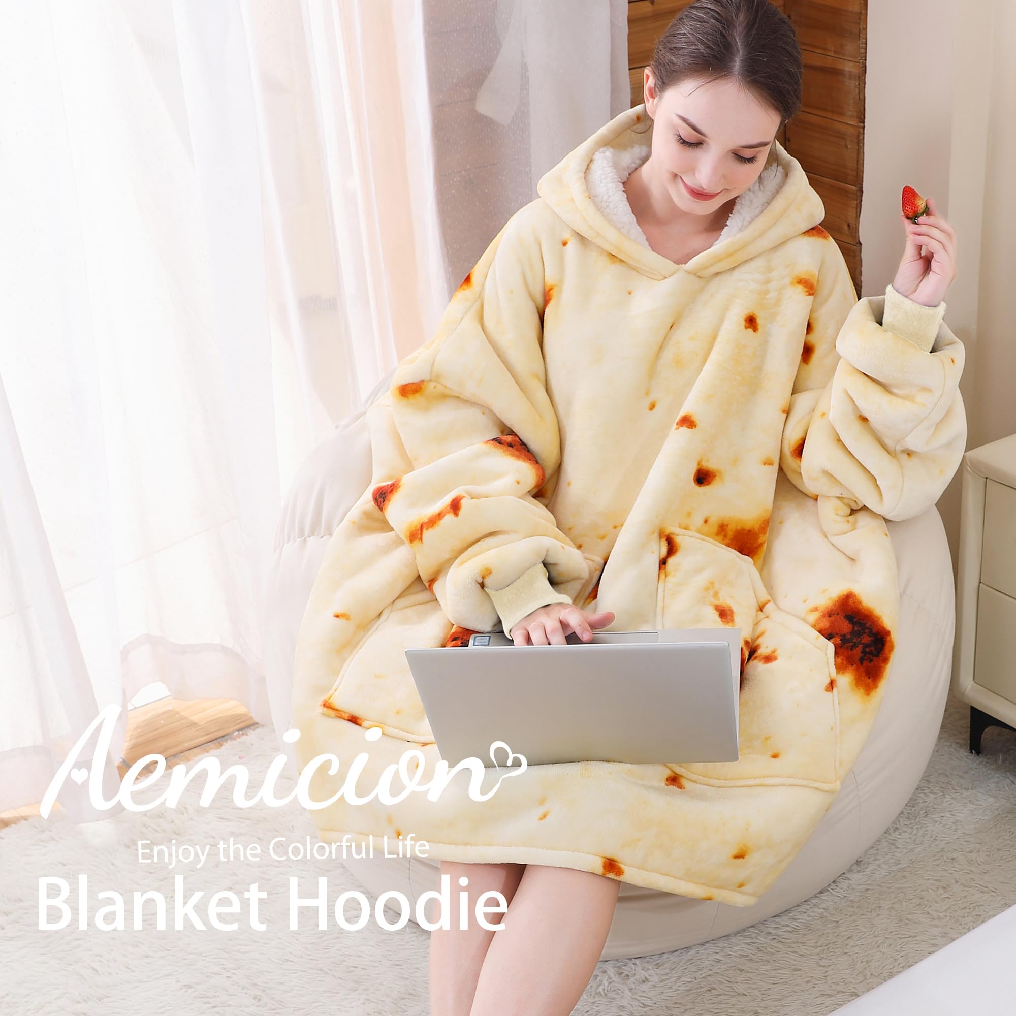Aemicion hoodie draped over chair to show oversized fit and size scale