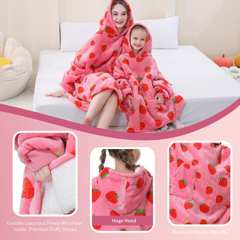 Aemicion strawberry hoodie styled on bed in bedroom scene suggesting relaxed comfort
