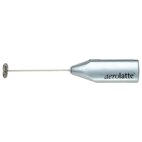 aerolatte held in hand to show handheld size and travel-friendly portability