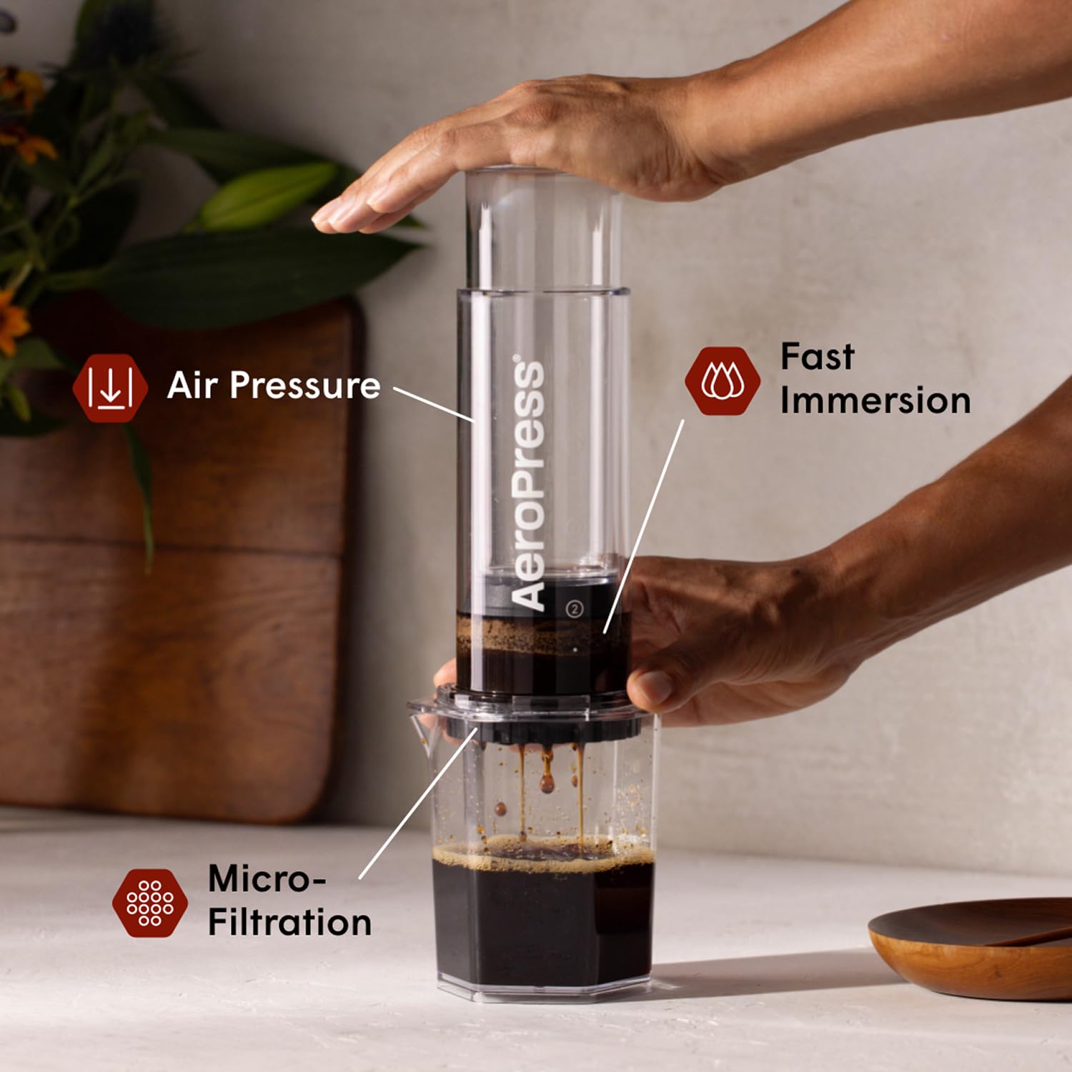 AeroPress Clear XL included carafe pouring coffee for easy serving and travel convenience