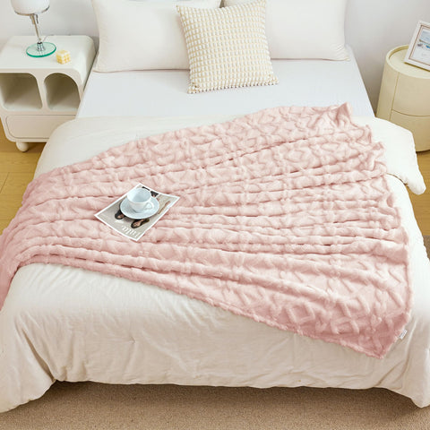Aganear throw used outdoors on picnic showing lightweight warmth benefit