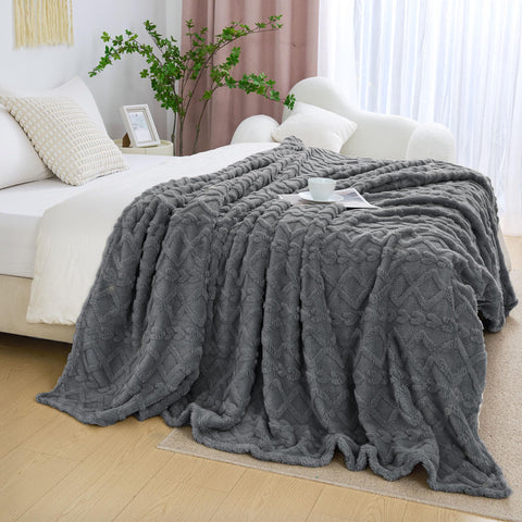 Aganear grey throw draped on sofa adding cozy decor and easy living appeal