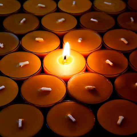 AGLARY tealight lit in holder on table creating warm ambient lighting