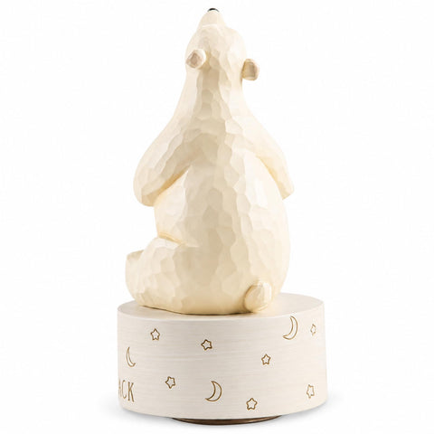 AIDLNS figurine placed on nursery shelf with books, adds sentimental decor