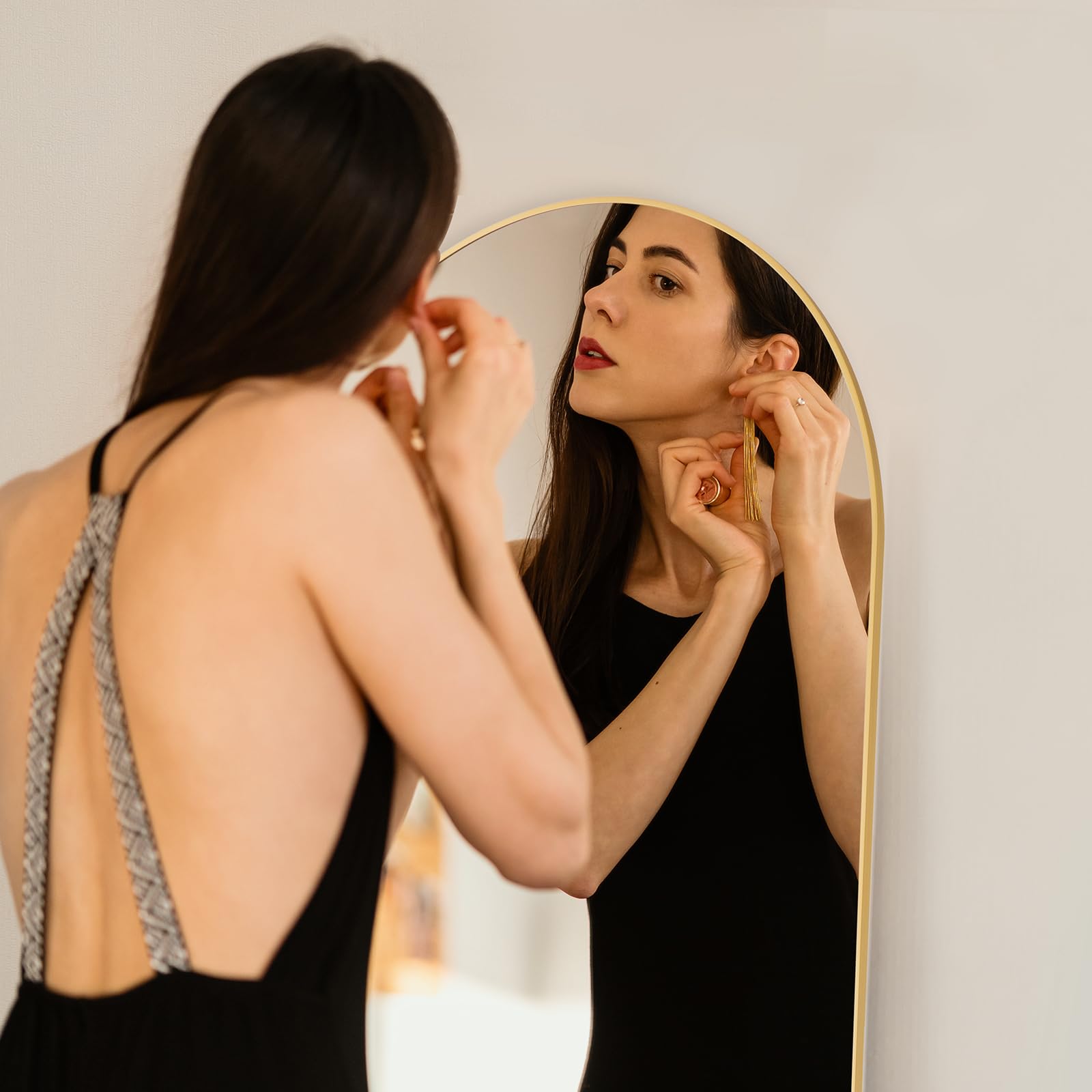 Aidoly mirror leaning in living room creating depth and stylish decor benefit