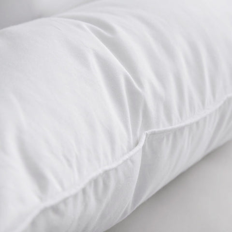 AIKOFUL rolled packaging being unboxed to restore pillow loft
