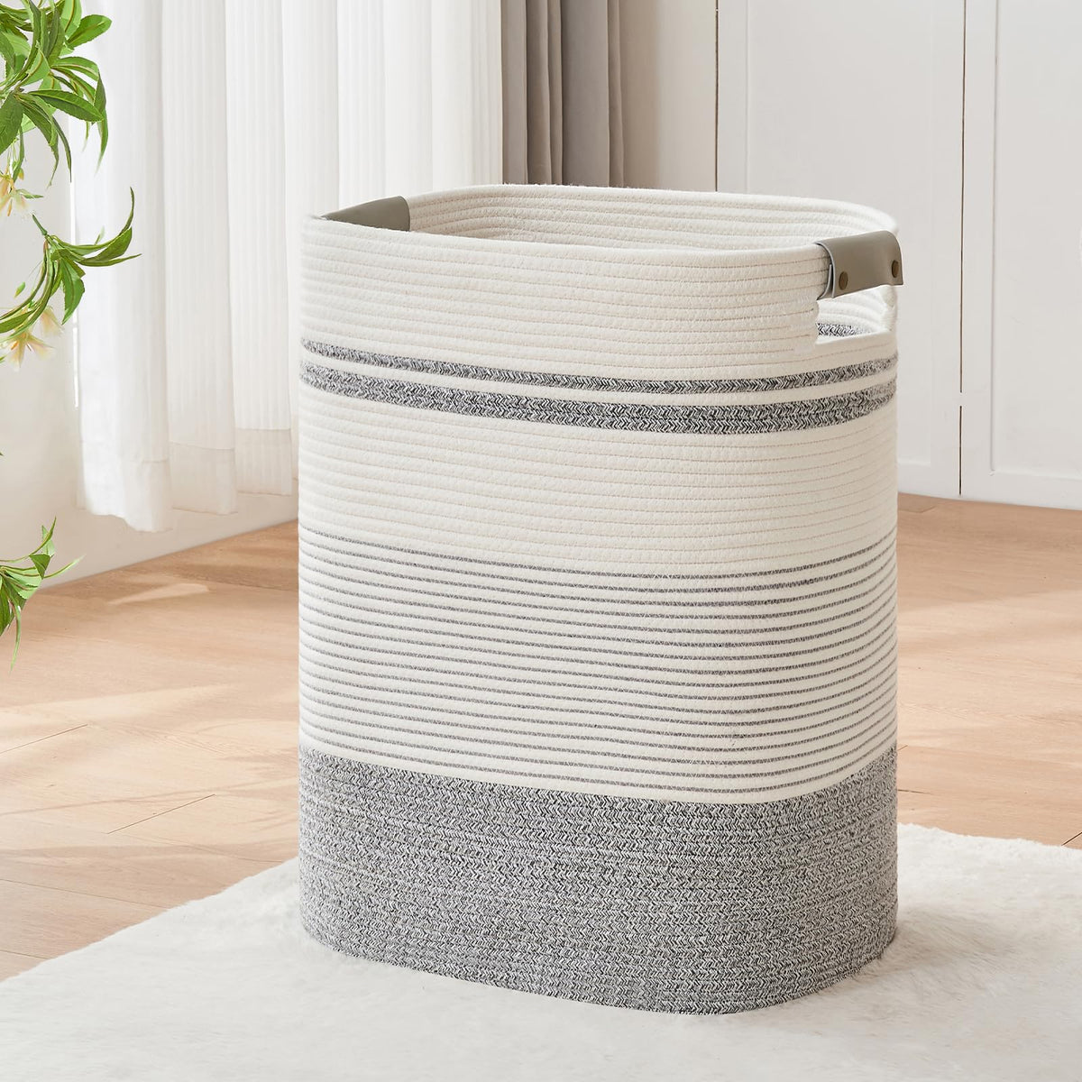 AINUOQI front view of tall cotton laundry basket showing elegant grey-white design and storage benefit