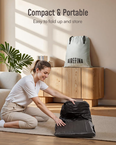 Airefina next to chair for scale demonstrating queen size and room fit