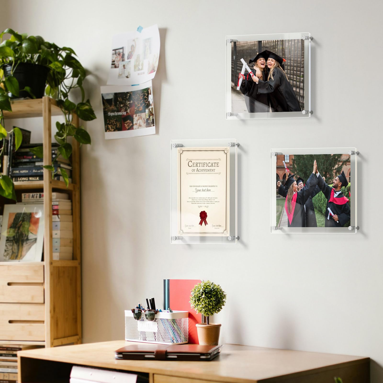 AITEE group of four frames arranged exhibiting coordinated decor